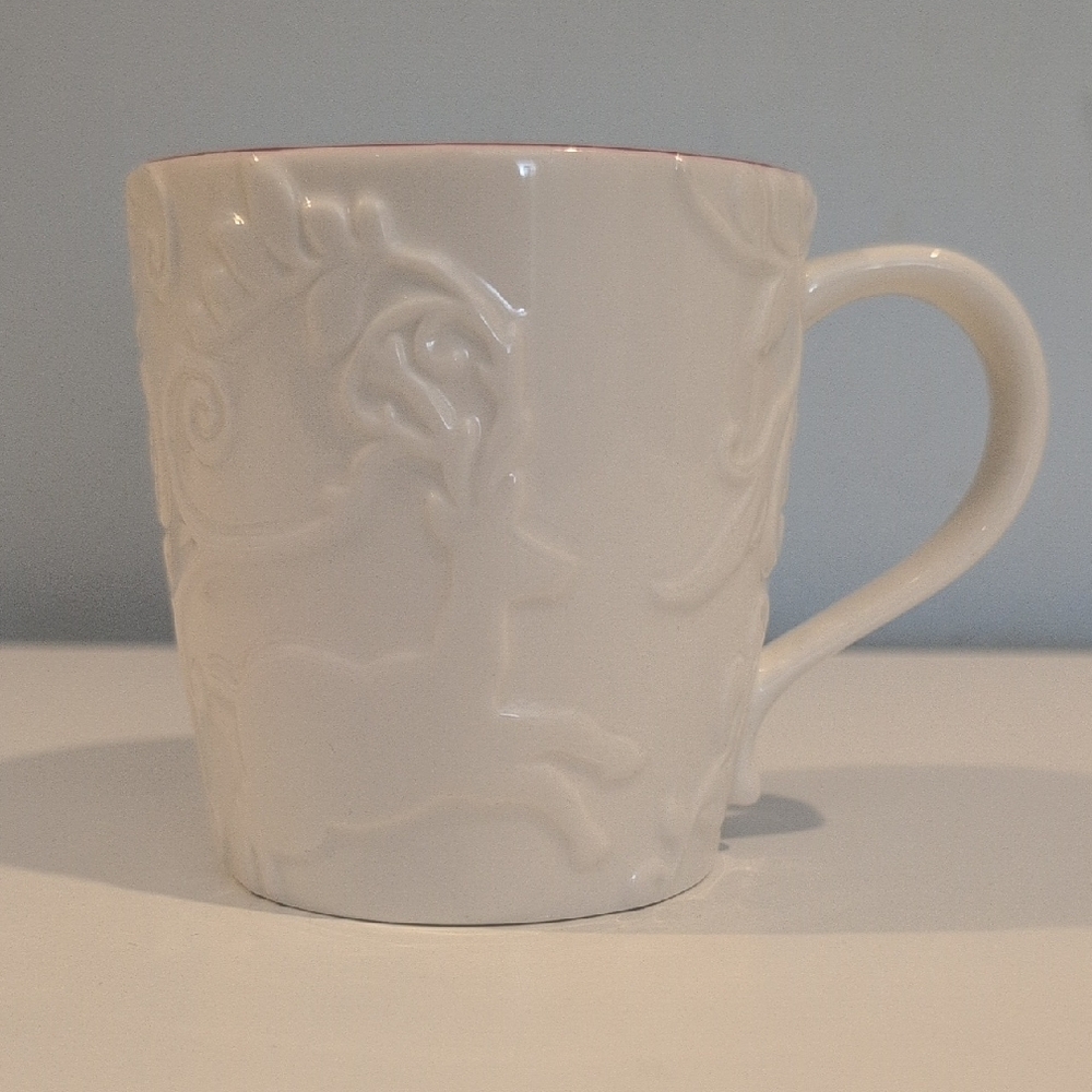 Starbucks Bone China 2009 Embossed Reindeer Holiday 12 Fluid Ounce Coffee Mug